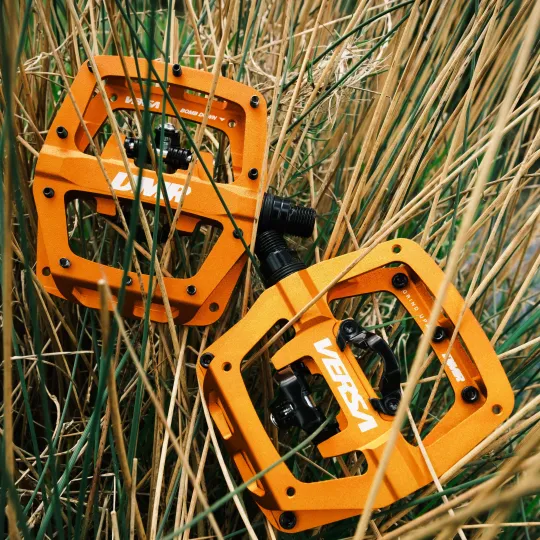 DMR Versa (One side SPD) – Bike Pedals (oranžové) | Katmar.cz